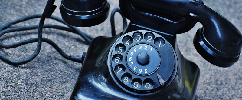 Vintage rotary telephone representing the missed calls small businesses never answer